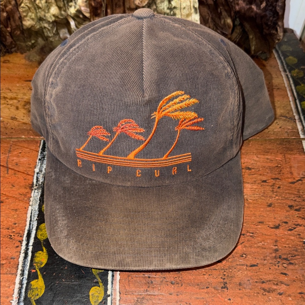 Rip Curl Dark Brown Cap with Vibrant Orange Design